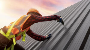 Professional roofer installing a roof