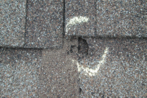 Roof with hail damage marked