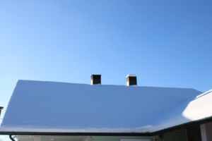 Roof in winter with snow covering the roof