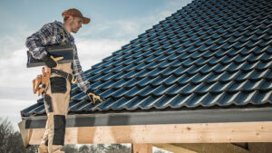Certified roofer inspecting a roof